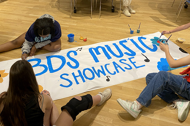 BDS Spring Music Showcase 05.31.24Scoop B is for Belonging at Belmont Day logo art